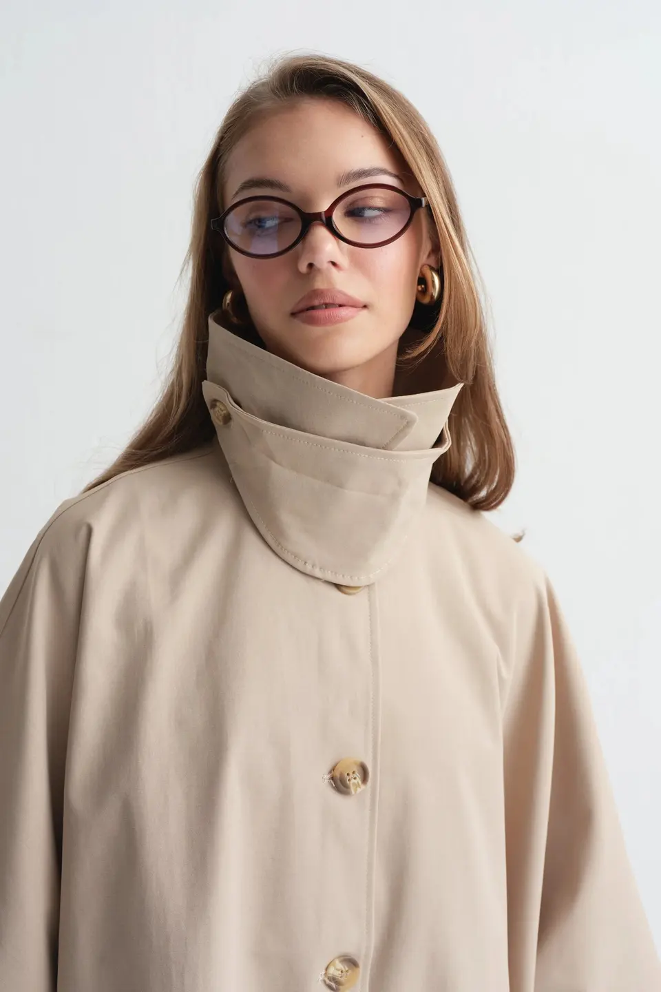 Poncho met knoopsluiting