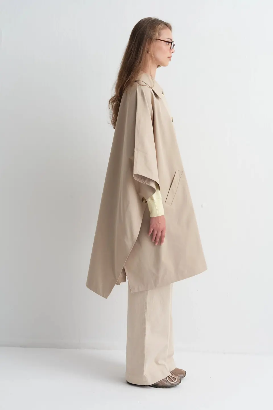 Poncho met knoopsluiting