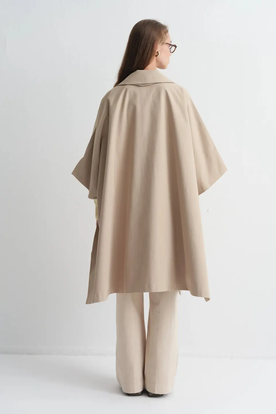 Poncho met knoopsluiting