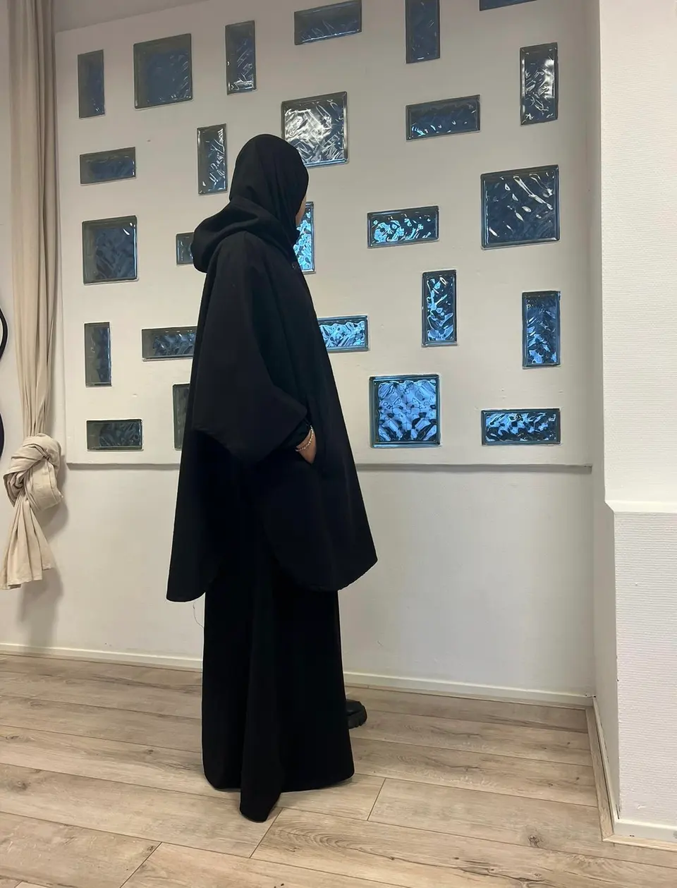 Warme poncho zwart